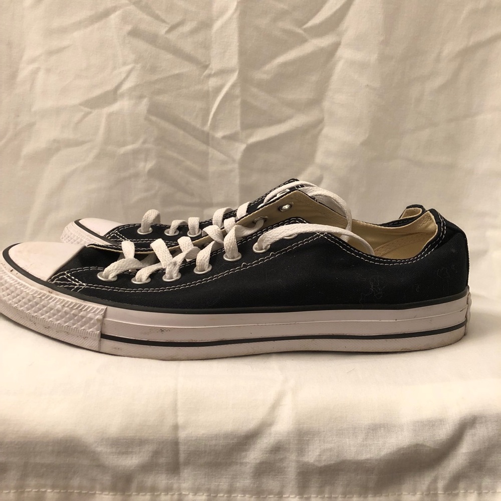 “Chuck Taylors” Low top Converse